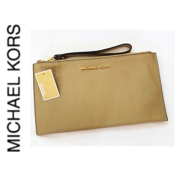 Michael Kors Handbags - NWT authentic MK genuine pebble leather wristlet